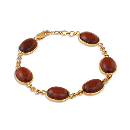 207 - A GARNET SET BRACELET, mounted in 18ct gold