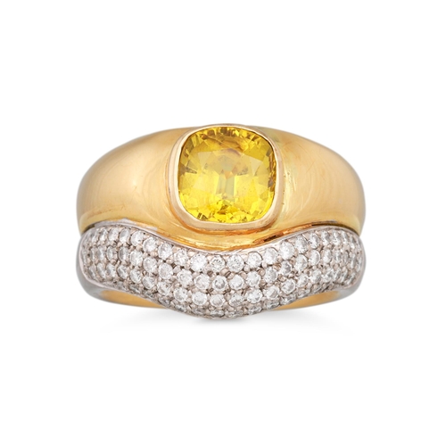 270 - A YELLOW SAPPHIRE AND DIAMOND RING, the princess cut sapphire mounted to an 18ct white and yellow go... 