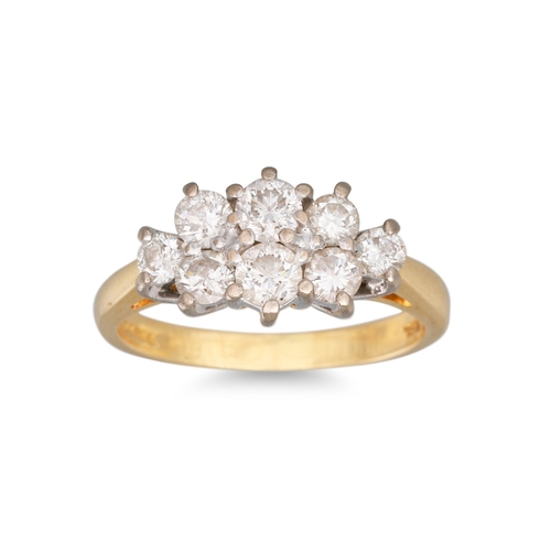 289 - A DIAMOND CLUSTER RING, the brilliant cut diamonds mounted in 18ct yellow gold. Estimated: weight of... 