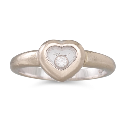 313 - A CHOPARD HEART SHAPED HAPPY DIAMOND RING, mounted in 18ct white gold, signed Chopard, in Chopard bo... 