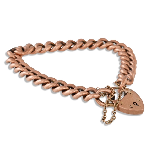 321 - A 9CT GOLD CURB LINK BRACELET, with padlock clasp, 18.8 g.