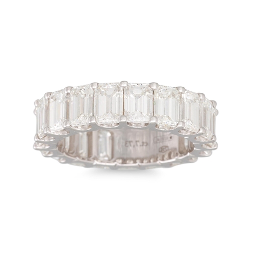 339 - A DIAMOND ETERNITY RING, the emerald cut diamonds mounted in 18ct white gold. Estimated: weight of d... 