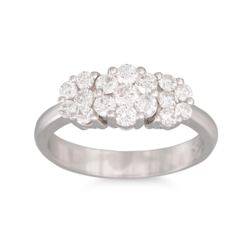 385 - A DIAMOND TRIPLE CLUSTER RING, the brilliant cut diamonds mounted in 18ct white gold. Estimated: wei... 