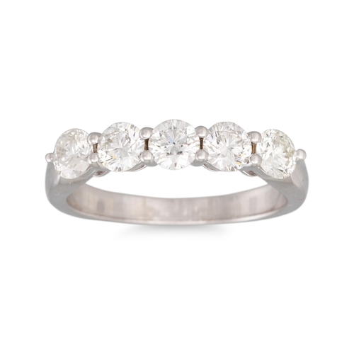 386 - A FIVE STONE DIAMOND RING, the brilliant cut diamonds mounted in 18ct white gold. Estimated: weight ... 