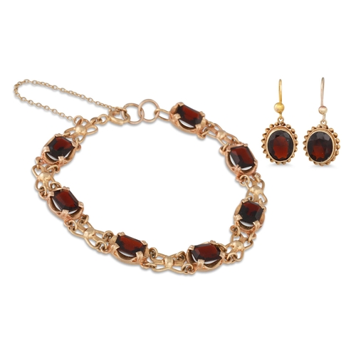 54 - A GARNET BRACELET, in 9ct gold with matching earrings, 16.7 g.