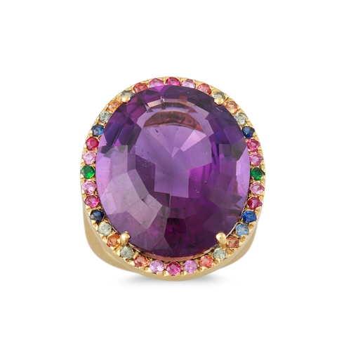 110 - AN AMETHYST AND MULTI COLOURED SAPPHIRE CLUSTER RING, the oval amethyst to sapphire surround, mounte... 