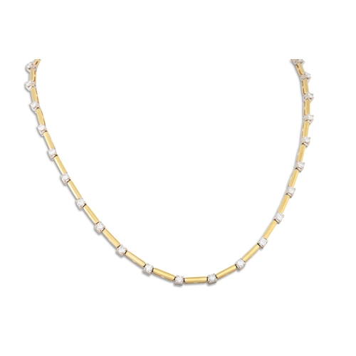 177 - A DIAMOND SET ARTICULATED NECKLACE, the 18ct gold necklace with diamond bar spacers. Estimated: weig... 