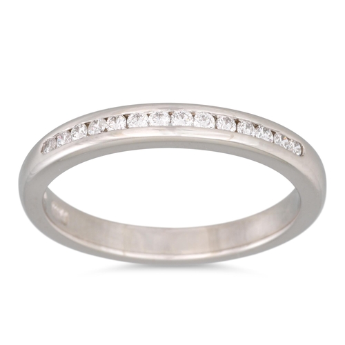 196 - A DIAMOND HALF ETERNITY RING, the channel set half hoop eternity ring mounted in platinum, Dublin ha... 