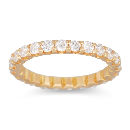 215 - A DIAMOND FULL BAND ETERNITY RING, the brilliant cut diamonds mounted in yellow gold. Estimated: wei... 