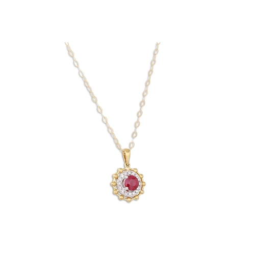 27 - A DIAMOND AND RUBY PENDANT, the circular ruby to diamond surround, mounted in 9ct gold on a chain