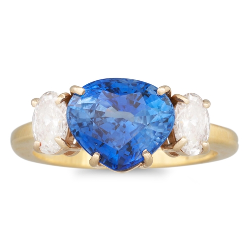 307 - A SAPPHIRE AND DIAMOND RING, the fancy cut sapphrie to oval brilliant cut diamond shoulders, mounted... 