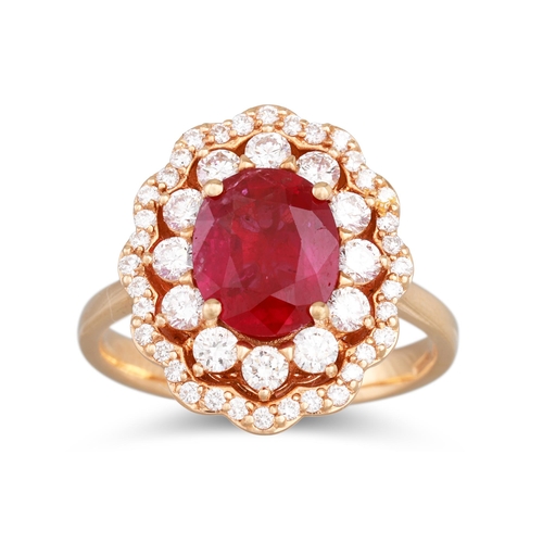 266 - A RUBY AND DIAMOND CLUSTER RING, the oval ruby to two rowed diamond surround, mounted in 18ct yellow... 