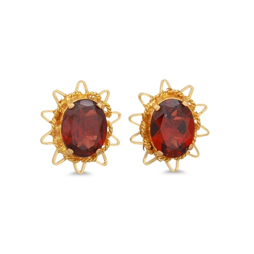 133 - A PAIR OF GARNET EARRINGS, mounted in yellow gold