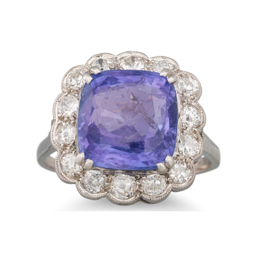 290 - A VINTAGE SAPPHIRE AND DIAMOND CLUSTER RING, the cushion cut colour change sapphire to an old cut di... 