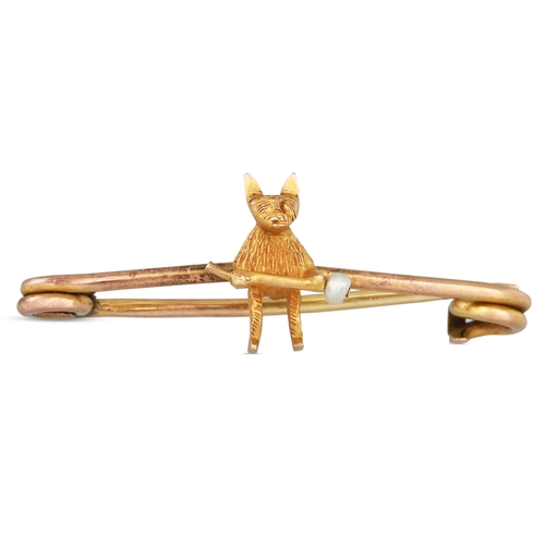 32 - AN ANTIQUE 9CT GOLD BAR BROOCH, in the form of a cat, with pearl