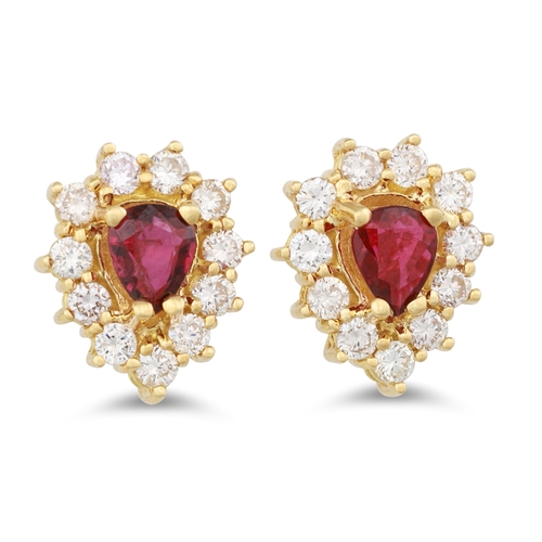 33 - A PAIR OF DIAMOND AND RUBY CLUSTER EARRINGS, the pear shaped rubies to diamond surround, mounted in ... 