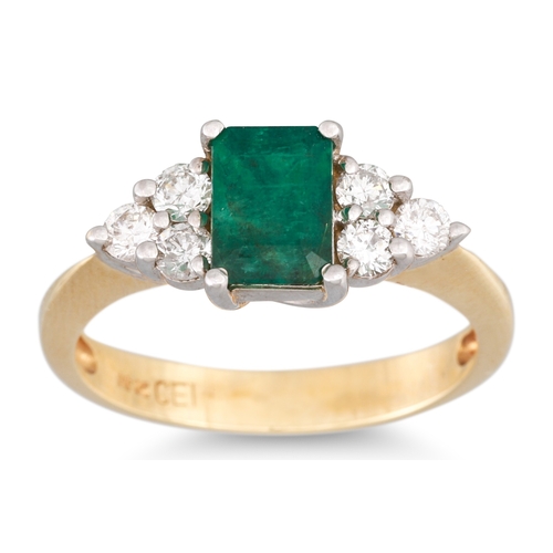 4 - AN EMERALD AND DIAMOND THREE STONE RING, the rectangular emerald to diamond trio sides, mounted in 1... 