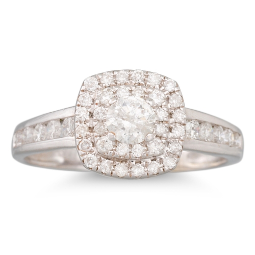 51 - A DIAMOND CLUSTER RING, the round brilliant cut diamond to a two rowed brilliant cut diamond surroun... 