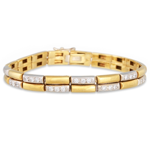 53 - A DIAMOND SET PANEL BRACELET, the alternating diamond set links in 18ct yellow gold, 24.7 g.