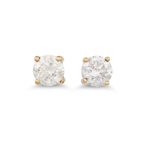 63 - A PAIR OF DIAMOND STUD EARRINGS, mounted in gold. Estimated: weight of diamonds: 0.40 ct. colour and... 