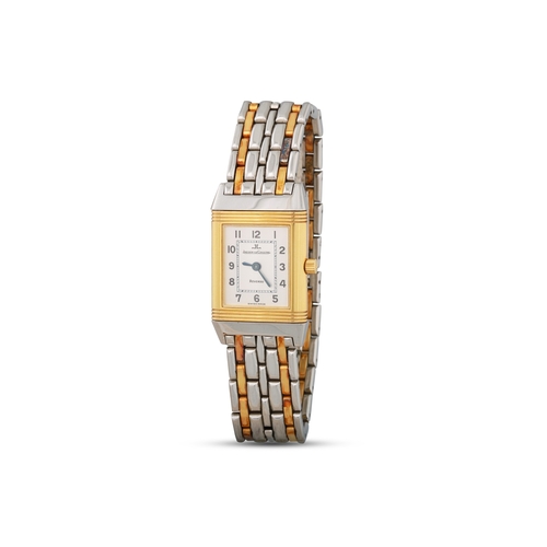 244 - A LADY'S STAINLESS STEEL BI COLOUR JAEGER - LE COULTRE REVERSO WRISTWATCH, silvered face with Arabic... 