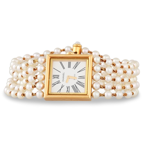 250 - A CHANEL MADEMOISELLE WRISTWATCH, a five row mother-of-pearl bracelet strap with 18ct gold watch hea... 