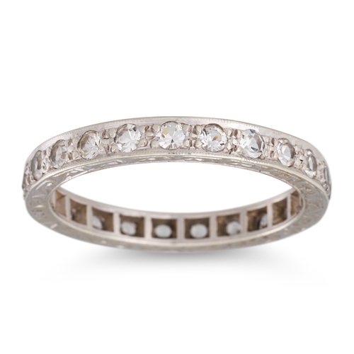 37 - A VINTAGE DIAMOND ETERNITY RING, the circular diamonds mounted in 9ct gold, with engraved mount. Est... 