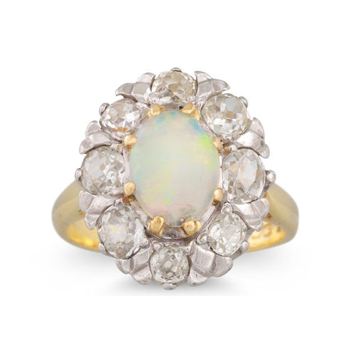 45 - A VINTAGE OPAL AND DIAMOND CLUSTER RING, the central opal to a diamonds surround, mounted in 18ct go... 