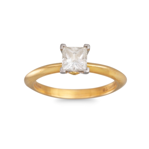 82 - A DIAMOND SOLITAIRE RING BY TIFFANY & CO., the princess cut diamond mounted in 18ct yellow gold, sig... 