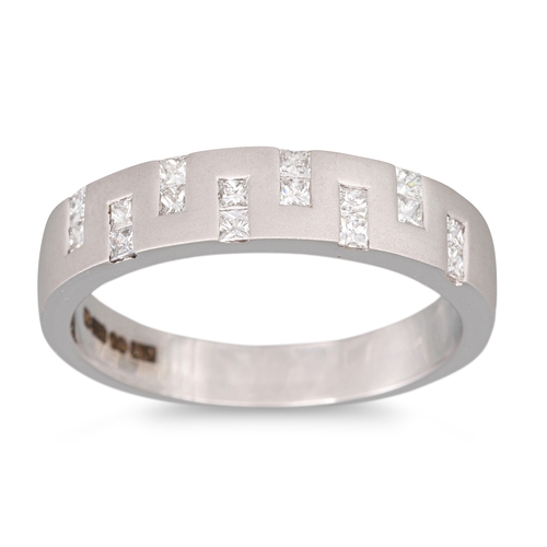 91 - A DIAMOND HALF ETERNITY RING, of contemporary design, mounted in 18ct white gold. Estimated: weight ... 