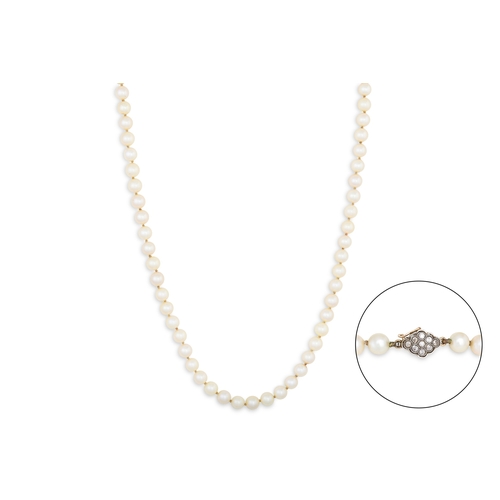 98 - A SET OF VINTAGE CULTURED PEARLS, with a diamond and gold clasp