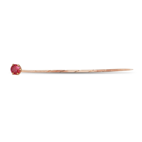 119 - A RUBY SET TIE PIN, mounted in 9ct gold