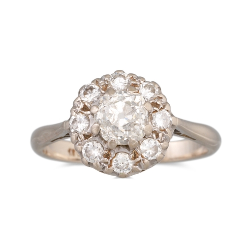 130 - A DIAMOND CLUSTER RING, set with old cut diamonds mounted in 18ct yellow gold. Estimated: weight of ... 