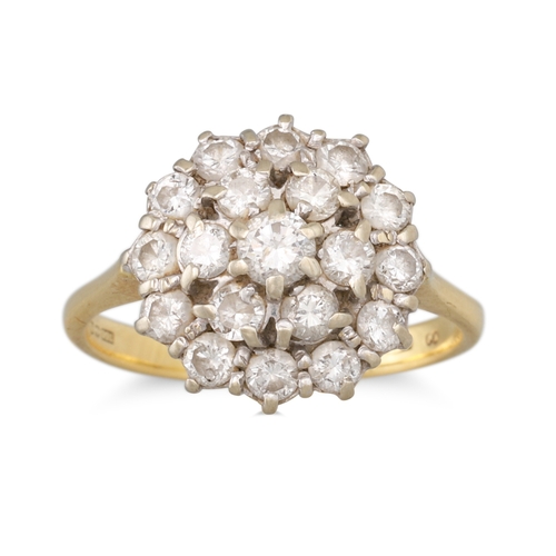 149 - A DIAMOND CLUSTER RING, the round brilliant cut diamond to double row diamond surround, mounted in 1... 
