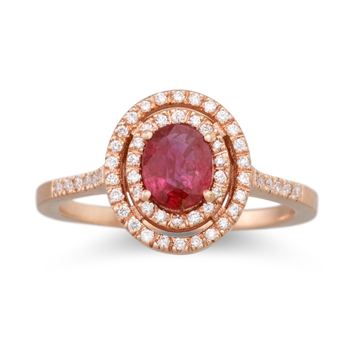 154 - A RUBY AND DIAMOND CLUSTER RING, oval halo form, diamond shoulders, mounted in 18ct yellow gold. Est... 