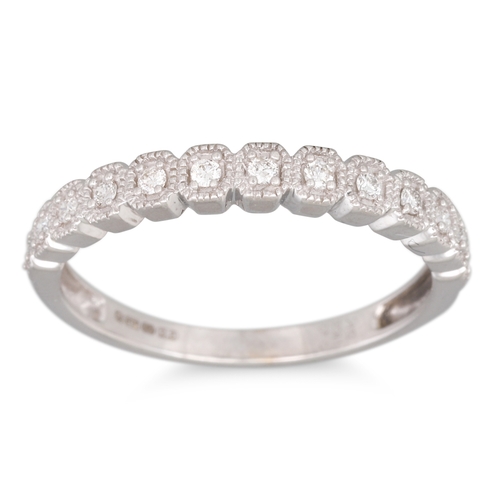 161 - A DIAMOND SET HALF HOOP DRESS RING, the round brilliant cut diamonds, mounted in 9ct white gold, siz... 