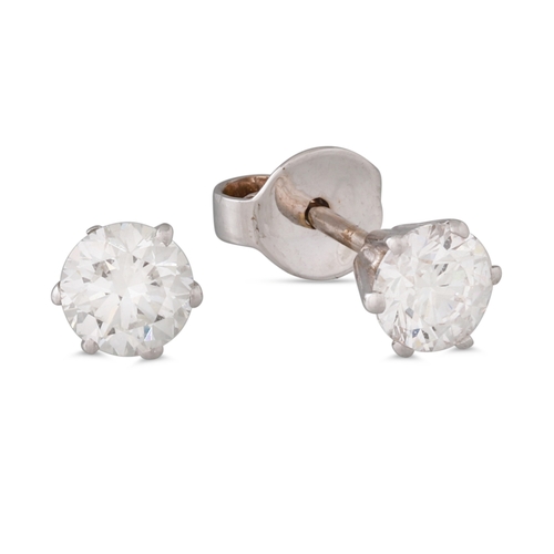 167 - A PAIR OF DIAMOND STUD EARRINGS, mounted in white gold. Estimated: weight of diamonds: 2 x 0.50 ct, ... 