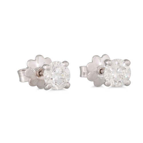 168 - A PAIR OF DIAMOND STUD EARRINGS, mounted in white gold. Estimated: weight of diamonds: 2 x 0.60 ct, ... 