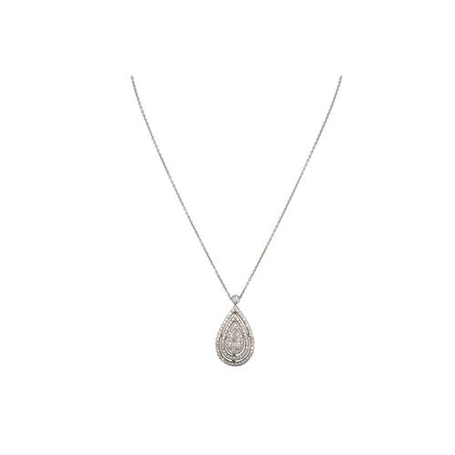184 - A DIAMOND CLUSTER PENDANT, the pear shaped stone to a brilliant cut diamond surround, in white gold.... 