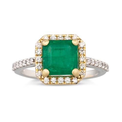 189 - A EMERALD AND DIAMOND CLUSTER RING, the princess cut emerald to diamond surround and shoulders, moun... 