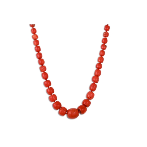 208 - A CORAL BEADED NECKLACE, to a silver clasp