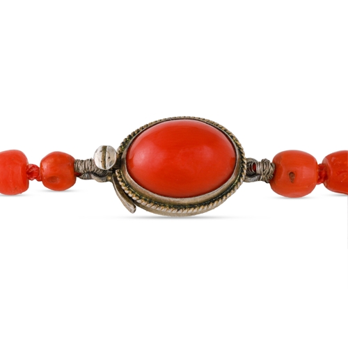 208 - A CORAL BEADED NECKLACE, to a silver clasp