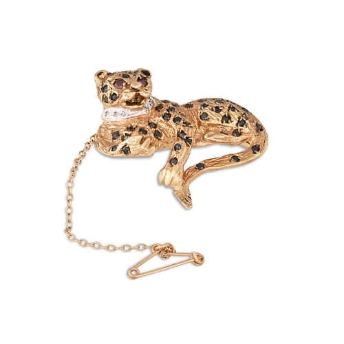 27 - A DIAMOND, RUBY AND SAPPHIRE BROOCH, in the form of a panther, mounted in 9ct gold