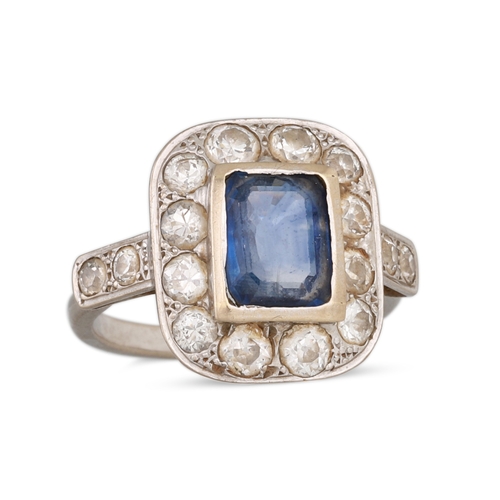 287 - A SAPPHIRE AND DIAMOND CLUSTER RING, the rectangular cut sapphire to diamond surround and shoulders,... 