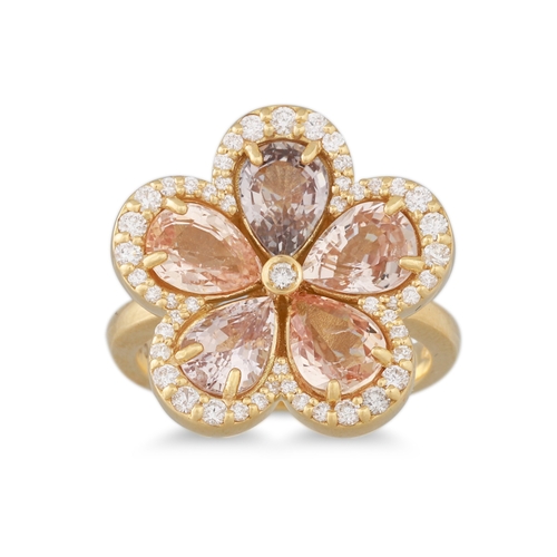 338 - A DIAMOND AND SAPPHIRE CLUSTER RING, of flower cluster form, the pear shaped pink sapphires to a dia... 