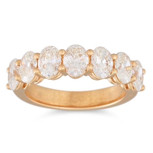 339 - A SEVEN STONE DIAMOND RING, the oval diamonds mounted in 18ct gold. Together with GIA Certs. X 7 sta... 