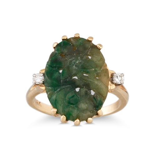 4 - A CARVED JADE RING, to diamond set shoulders, mounted in 14ct gold, size P
