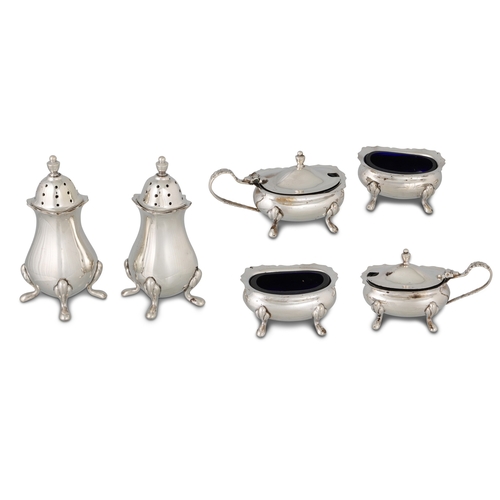 435 - A MODERN IRISH SILVER SIX-PIECE CONDIMENT SET, comprising a pair of pepper pots, a pair of salt dish... 