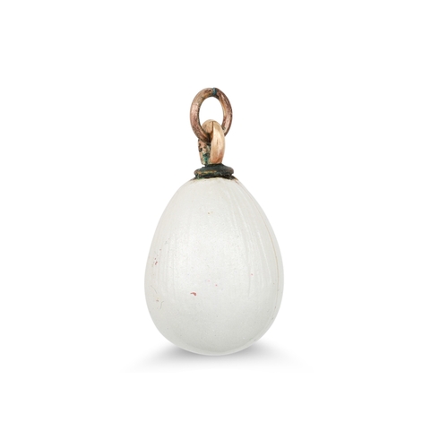 45 - A VINTAGE CONTINENTAL WHITE ENAMEL EGG PENDENT, with gold fittings