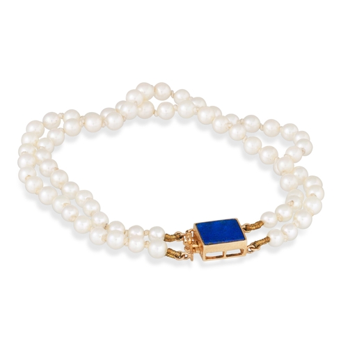 49 - A DOUBLE ROW CULTURED PEARL BRACELET, with 14ct gold lapis lazuli clasp